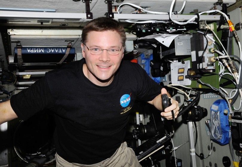 ISS024-E-013387 (5 Sept. 2010) --- NASA astronaut Doug Wheelock, Expedition 24 flight engineer, uses a ham radio system in the Zvezda Service Module of the International Space Station.