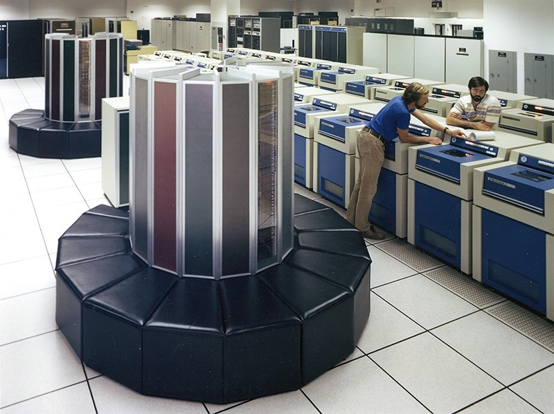 A Cray-1 Supercomputer with workers at Lawrence Livermore National Laboratory in 1983